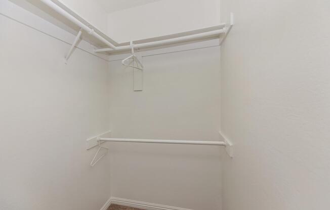 a white refrigerator freezer sitting in a room