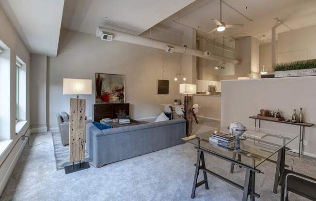 a living room with a couch and a table