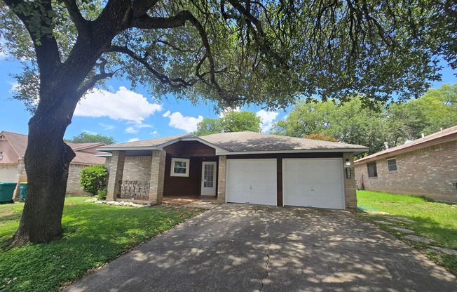 Welcome home to 8015 Forest Ash!