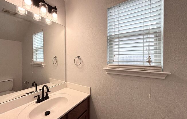 Beautiful home in the desirable Gardens at Woodlake community!