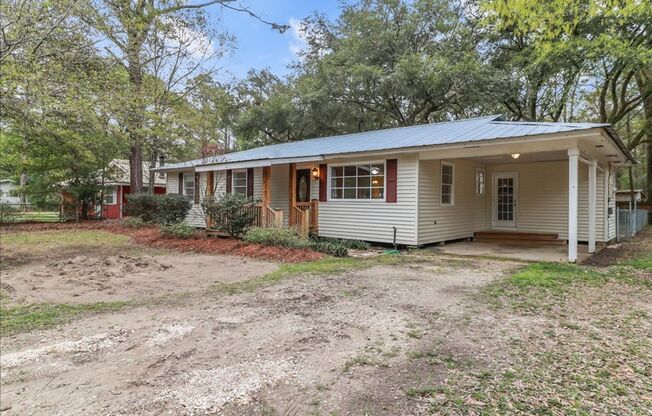 Completely Renovated 3 Bed 2 Bath home with HUGE fenced yard & shed