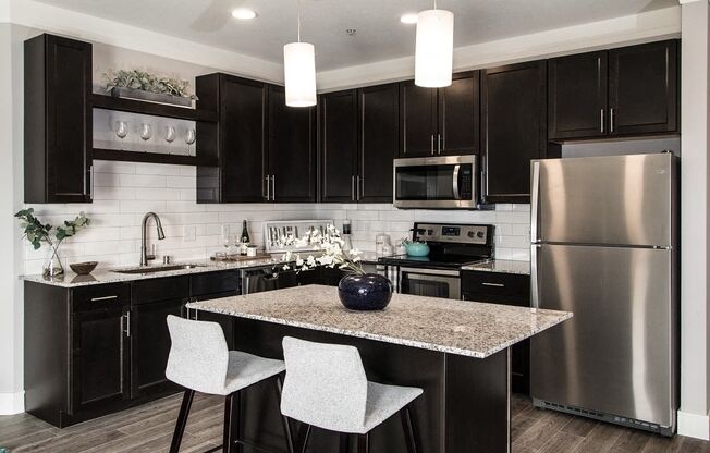 Chef Inspired Kitchen Islands with Chic Pendant Lighting at The Edison at Avonlea, Lakeville, MN