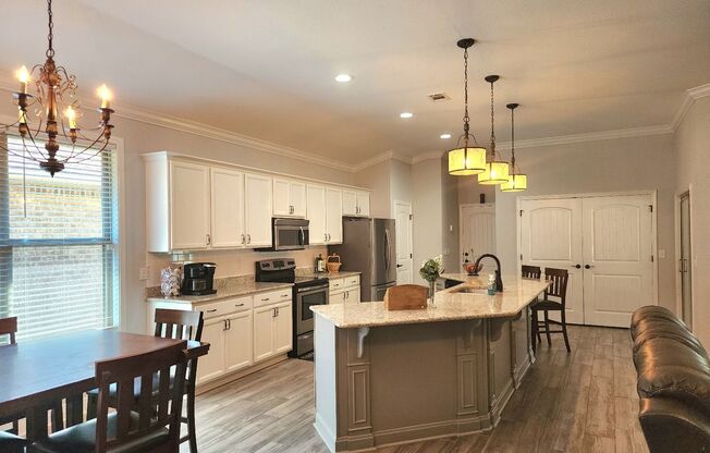 Luxurious 3 Bedroom, 2 Bath Home in the Exclusive Gated Pool Community of Heron Bayou Subdivision!