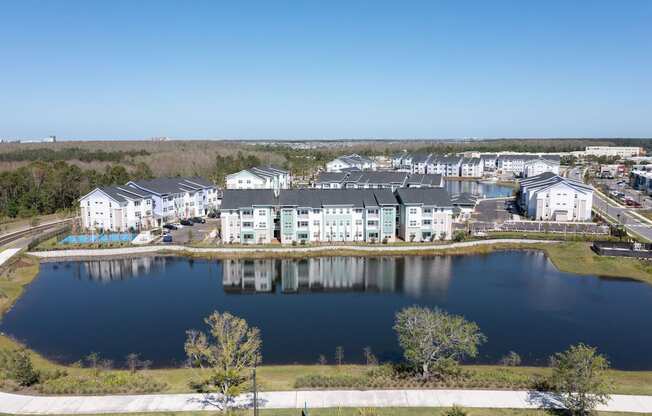 The large beautiful pond beside the apartment buildings at Lake Nona Concorde