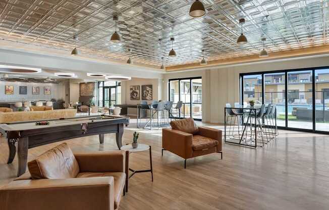 A modern living room with a glass ceiling and a dining area.