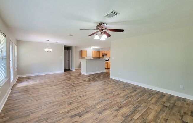 Lovely 3/2/2 home in quiet Newport subdivision of Crosby. Large open concept home with formal dining room that can be used as a second living space. Large bedrooms, master has separate sitting area. Big backyard with over-sized back deck.  Beautiful Vinyl