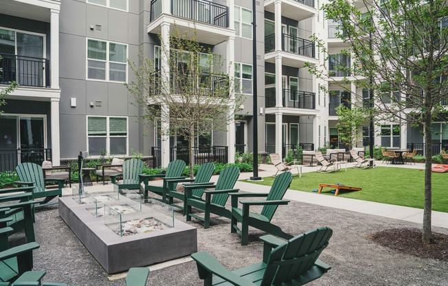 Multiple courtyards with lounge areas, grilling stations and lawn games.