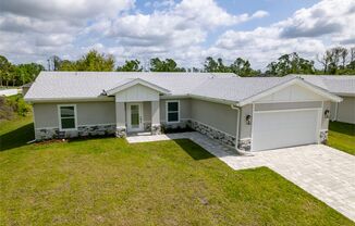 North Port Florida_Brand New Home with SOLAR PANELS and water filtration system! 3 bed / office / 2 car garage!