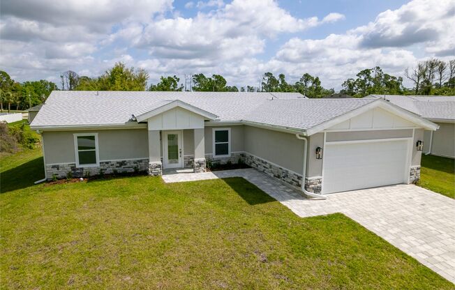 North Port Florida_Brand New Home with SOLAR PANELS and water filtration system! 3 bed / office / 2 car garage!