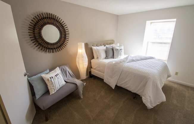 This is a picture of the primary bedroom in an upgraded 980 square foot, 2 bedroom, 1 bath model apartment at Fairfield Pointe Apartments in Fairfield, Ohio.