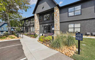 A parking lot with a sign that says "Future Reserved Parking".
