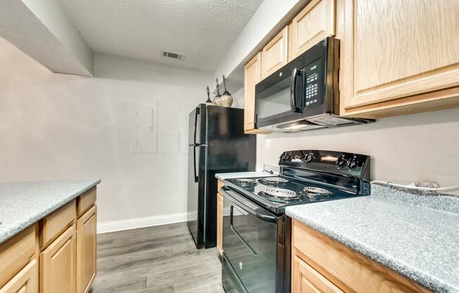 the kitchen of our studio apartment estates