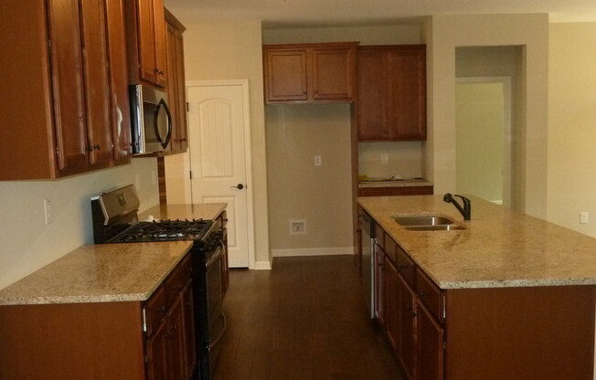 Inviting 4BR Ranch with Bonus Room in a Swim & Play Community