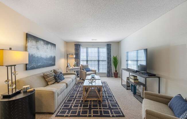 a living room with a couch and a television