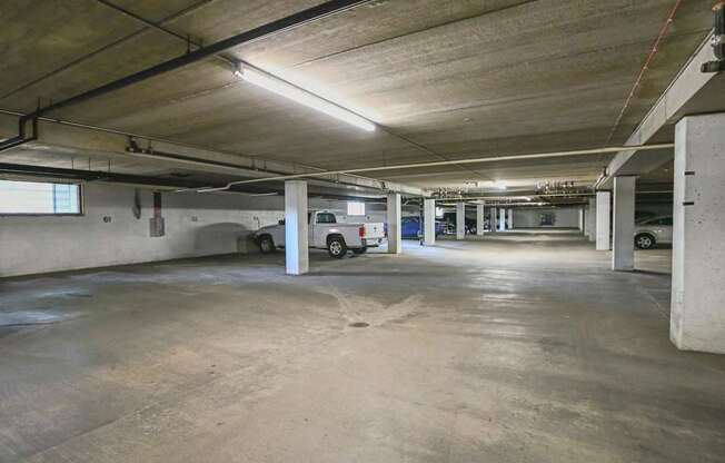 a parking garage with a truck parked in it