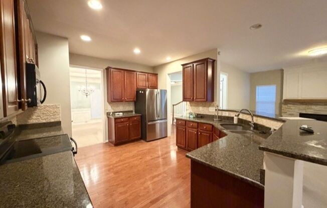Stunning 5 Bed/3.5 Bath Home in Vibrant Concord NC - 2 Car Attached Garage - Large Open Kitchen - Gas Fireplace - Fenced Backyard - Community Pool/Playground