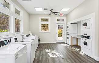 Community Laundry Center with Washing Machines and Dryers at Element 41 Apartments located in Marietta, GA.