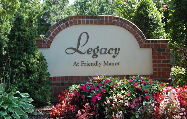A sign that says Legacy at Friendly Manor.