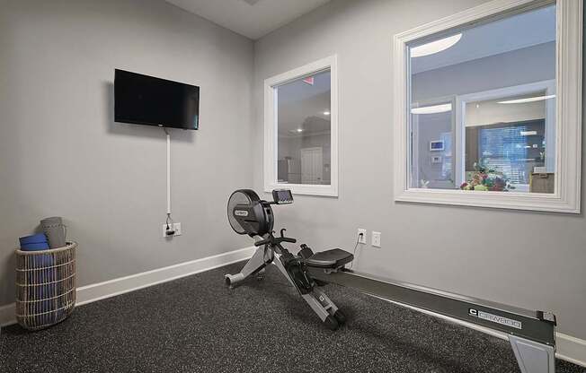 A sign that says "Newly Renovated" is in front of a building.