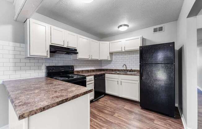 Overland Park, KS Apartments - Treetop Lodge - Photo of luxury renovated kitchen