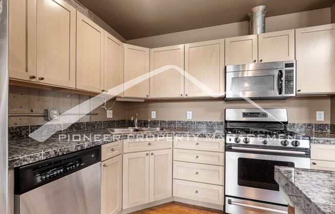 Modern Industrial Condo Downtown with Parking!