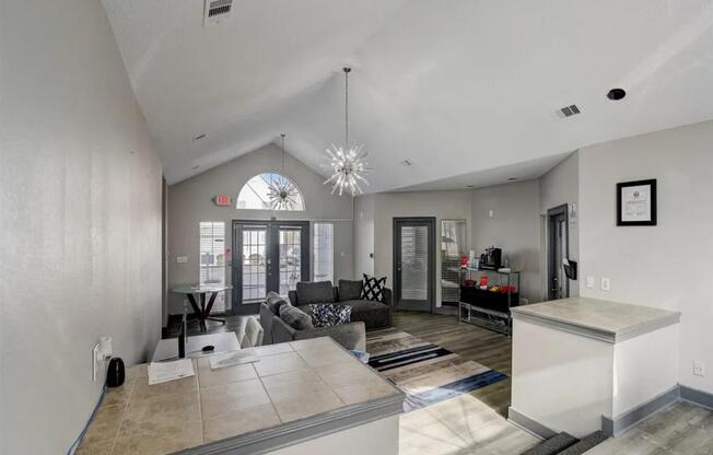 the living room and kitchen of a new home at The Sapphire, Georgia, 30035