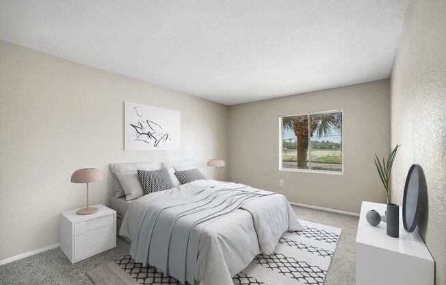 Model bedroom with plush carpeting