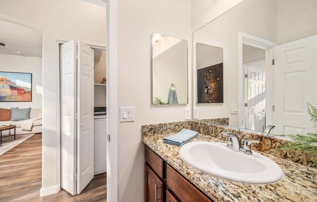 Bathroom Near Washer and Dryer at Avilla Marana Apartment Homes in Tucson Arizona