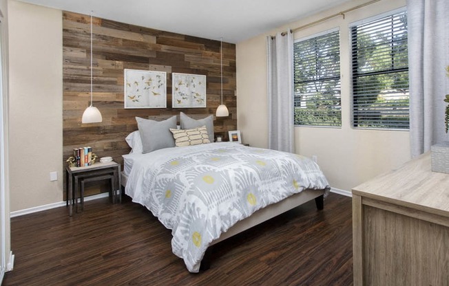 Rancho Bernardo, San Diego, CA Apartments-The Reserve at 4S Ranch-Bedroom with Hardwood Style Flooring, Large Windows, and Over Heading Lighting