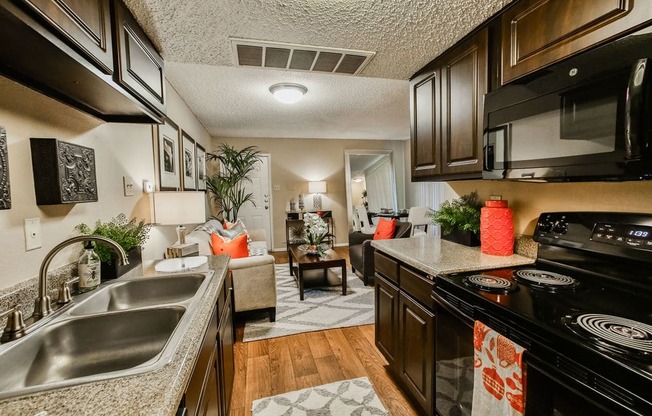 interior kitchen with living room at Oaks at Greenview, Houston