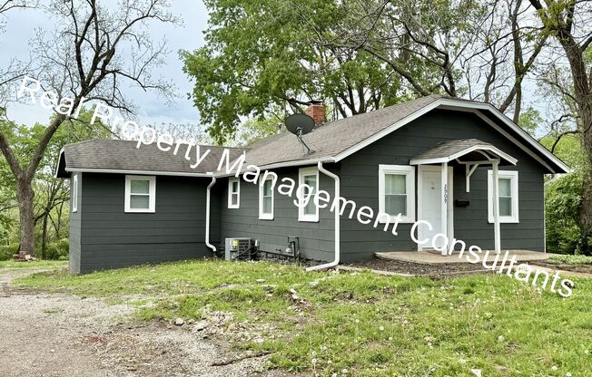 Spacious 4 Bedroom, 2 Bath Home with Outbuilding Storage and Fantastic Outdoor Living!