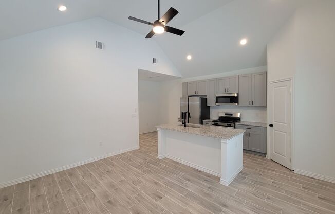 Beautiful single-story 3-bedroom, 2-bath home featuring an open floor plan, kitchen island, 42" soft-close cabinets, stainless steel appliances, large walk-in pantry, and tile flooring throughout. Primary suite includes a walk-in closet and walk-in shower