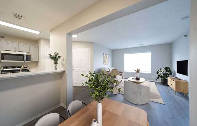 A modern kitchen with a dining table and chairs.