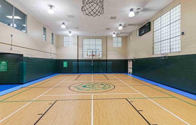 a basketball court in a gym at a community center