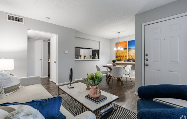 Spacious living room viewing dining and kitchen