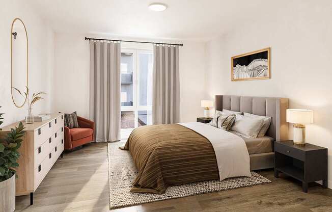 A bedroom with a large bed and a red chair.