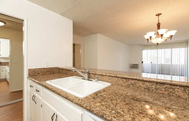 Kitchen with White Appliances and White Cabinets