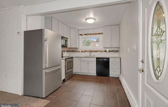 Welcome to this 4 bedroom 2 bath home in the Crabtree section of Levittown.