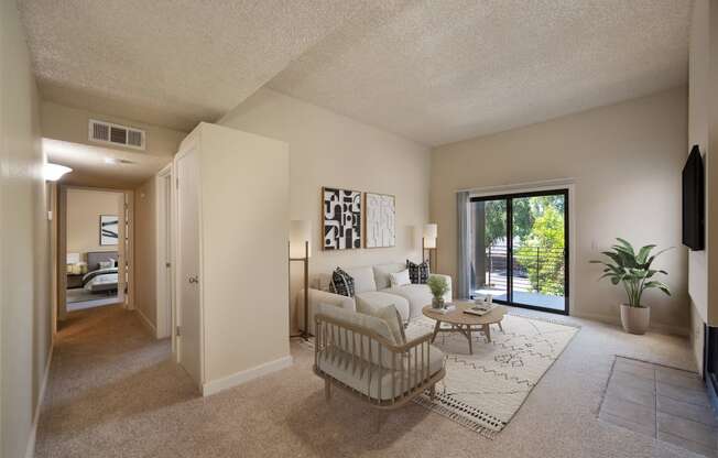 an open living room with a couch and a table