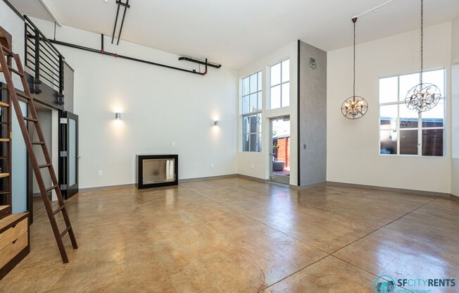 SoMa: Luxuriously Remodeled Conversion Live/Work Loft w/ Private Patio, W/D in unit & Garage Parking