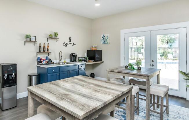 a living room with a sink and a window