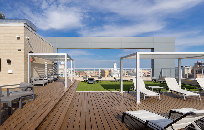 Wooded rooftop deck and chaise loungers to soak in the view