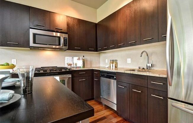 Avail Now: Corner Unit at Ruby in Eastlake – Canal Views, Natural Light & Parking