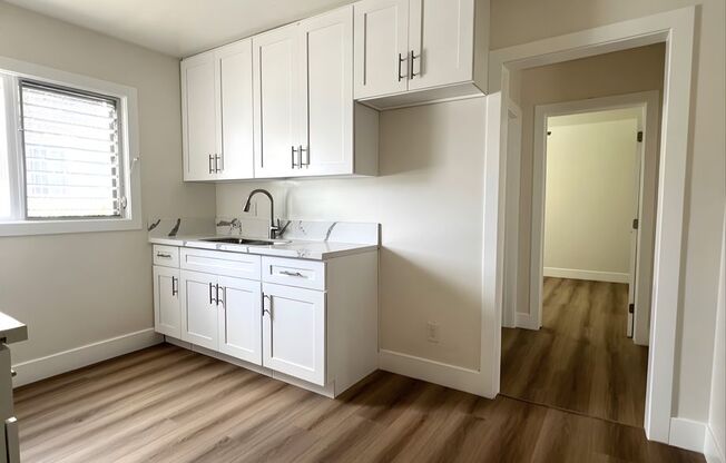 1256 W. 39th St