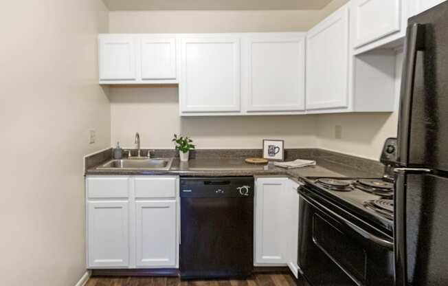 This is a photo of the kitchen of a 742 square foot, 2 bedroom apartment at Romaine Court Apartments in the Oakley neighborhood of Cincinnati, Ohio.