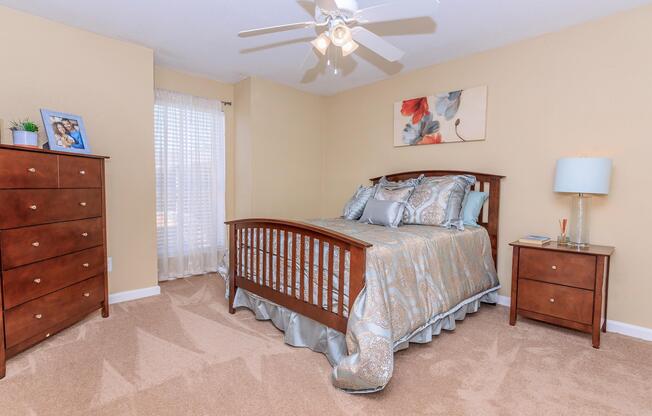 a bedroom with a bed in a room