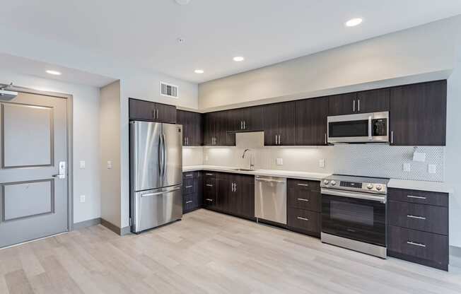Kitchen with stainless steel appliances at Bayswater Apartments, Burlingame, 94010