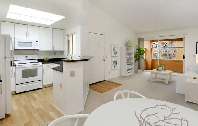 Kitchen and Carpeted Living Room with Balcony