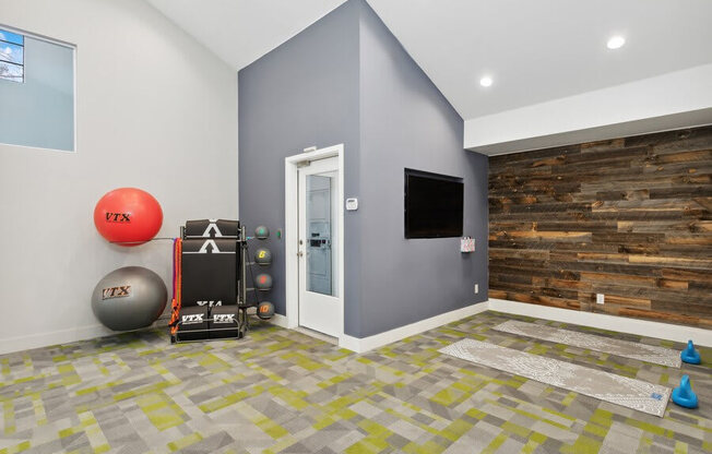Community Fitness Center with Equipment and Yoga/Meditation Area at Creek 2645 Apartments in Sacramento, CA.