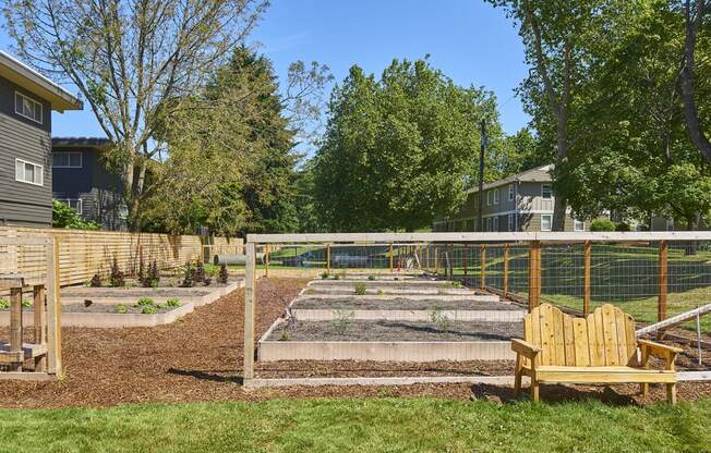 Community garden fenced in for residents to plant vegetables, herbs and more.at Woodhaven, Everett